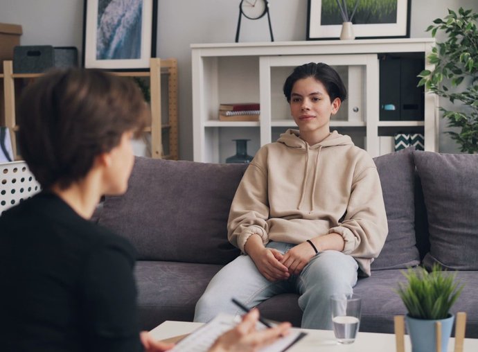 Therapist listening compassionately during a counseling session