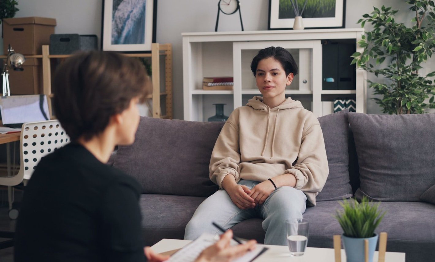 Therapist listening compassionately during a counseling session