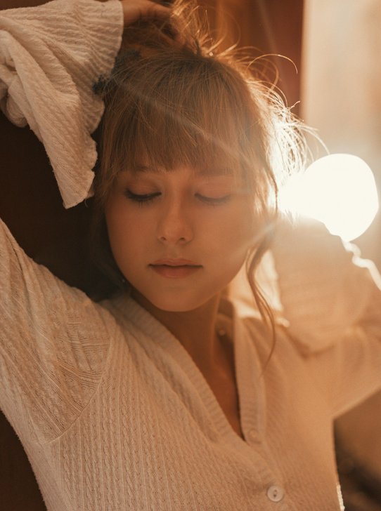 Person feeling calm and at ease during therapy